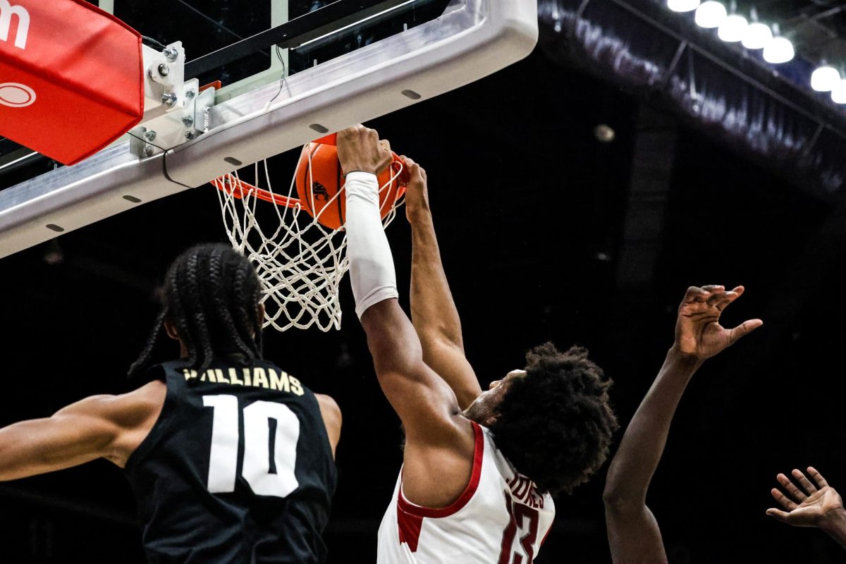 Forward Isaac Jones dunks the ball during an NCAA men’s basketball game against Colorado, Jan. 27, 2024, in Pullman, Wash.