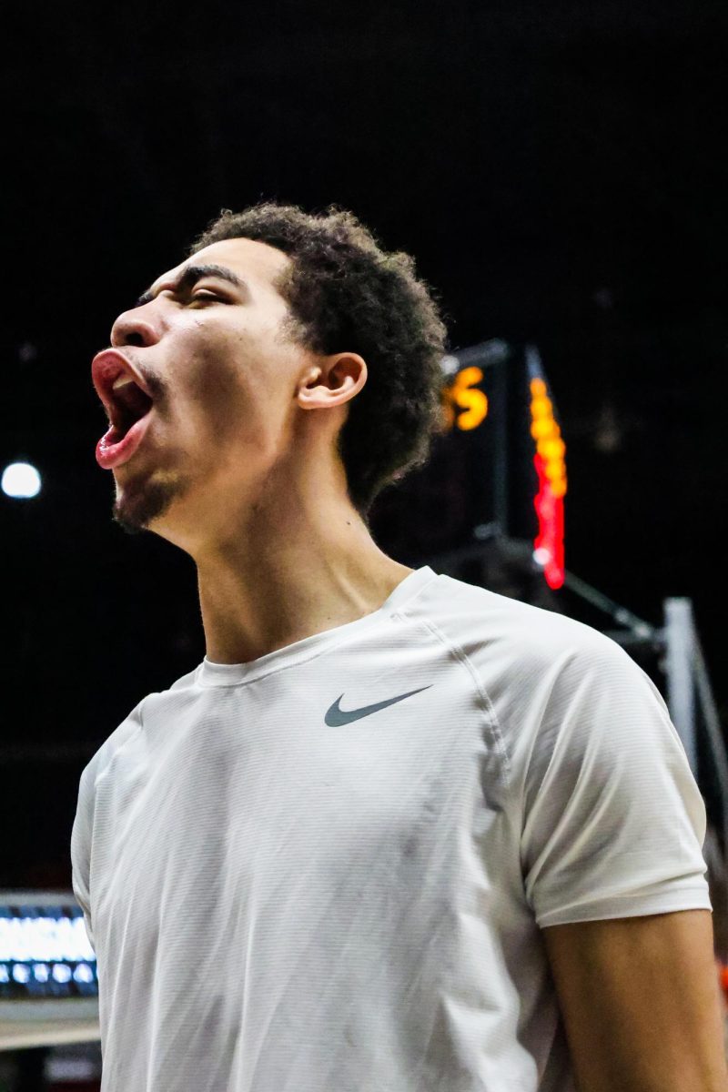 Guard Myles Rice yells during warm-ups to hype himself up before an NCAA mens basketball game against Utah, Jan. 24, 2024, in Pullman, Wash.