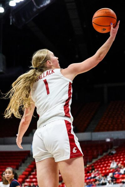 WSU guard Tara Wallack leaps for a layup in an NCAA women's basketball game against Arizona, Jan. 21, 2024, in Pullman, Wash.