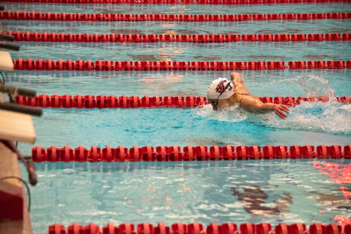 WSU womens swimmer in a race during an NCAA women’s swim meet against, University of Southern California, Saturday, Jan. 20, 2024, in Pullman, Wash.