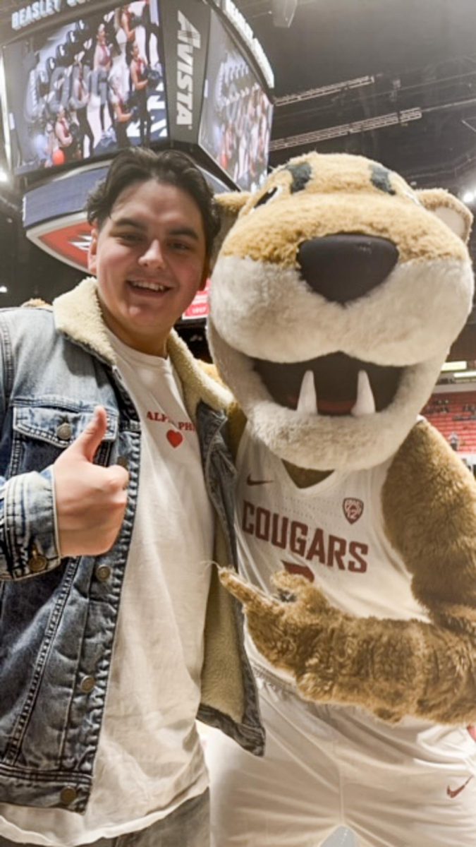 Brayden+Andersen-Masias+and+Butch+T.+Cougar+at+a+WSU+basketball+game.