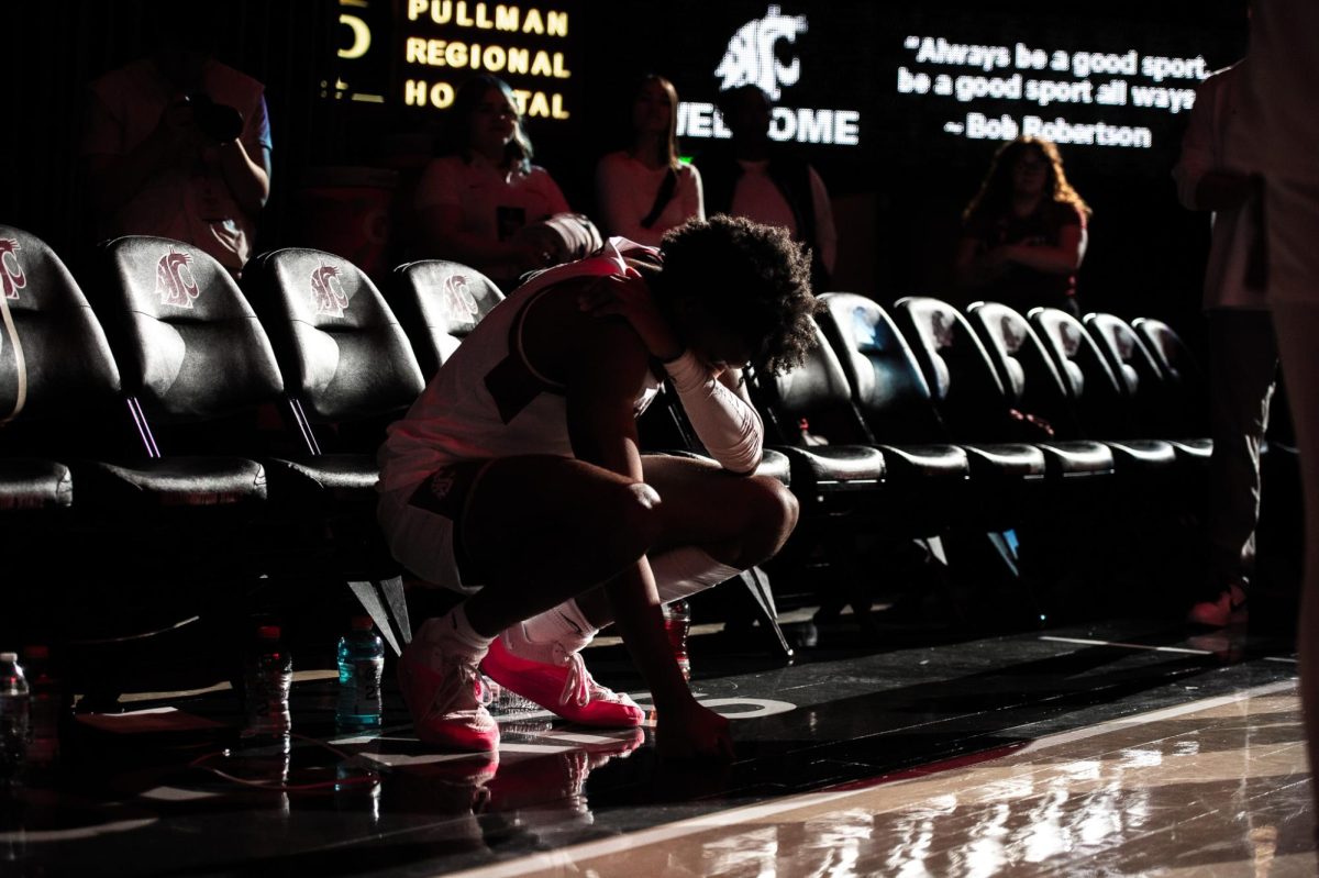 Isaac Jones takes a second before walking out after being introduced as a starter, Feb. 15, in Pullman, Wash.