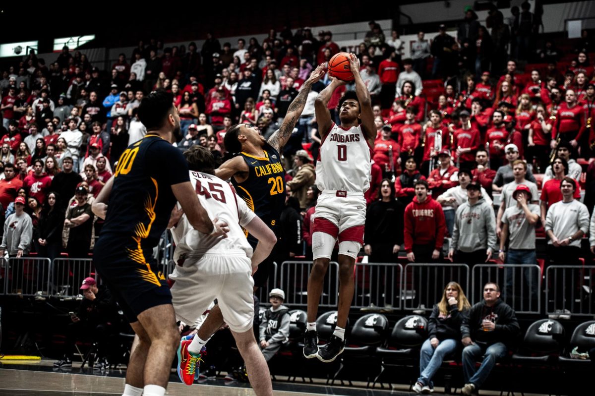 Jaylen Wells shoots from just inside the three-point line for a quick 2 points early in the first half, Feb. 15, in Pullman, Wash.