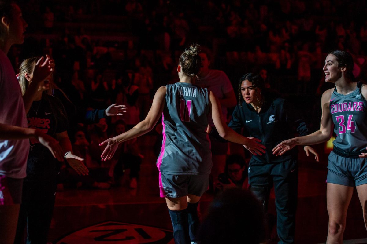 Astera Tuhina walking out after being named a starter against Cal, Feb. 9, in Pullman, Wash.