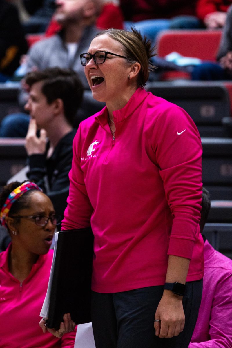 WSU women’s basketball Coordinator of Operations Kate Werner screams from the bench in an NCAA womens basketball game against Stanford, Feb. 11, 2024, in Pullman, Wash. 