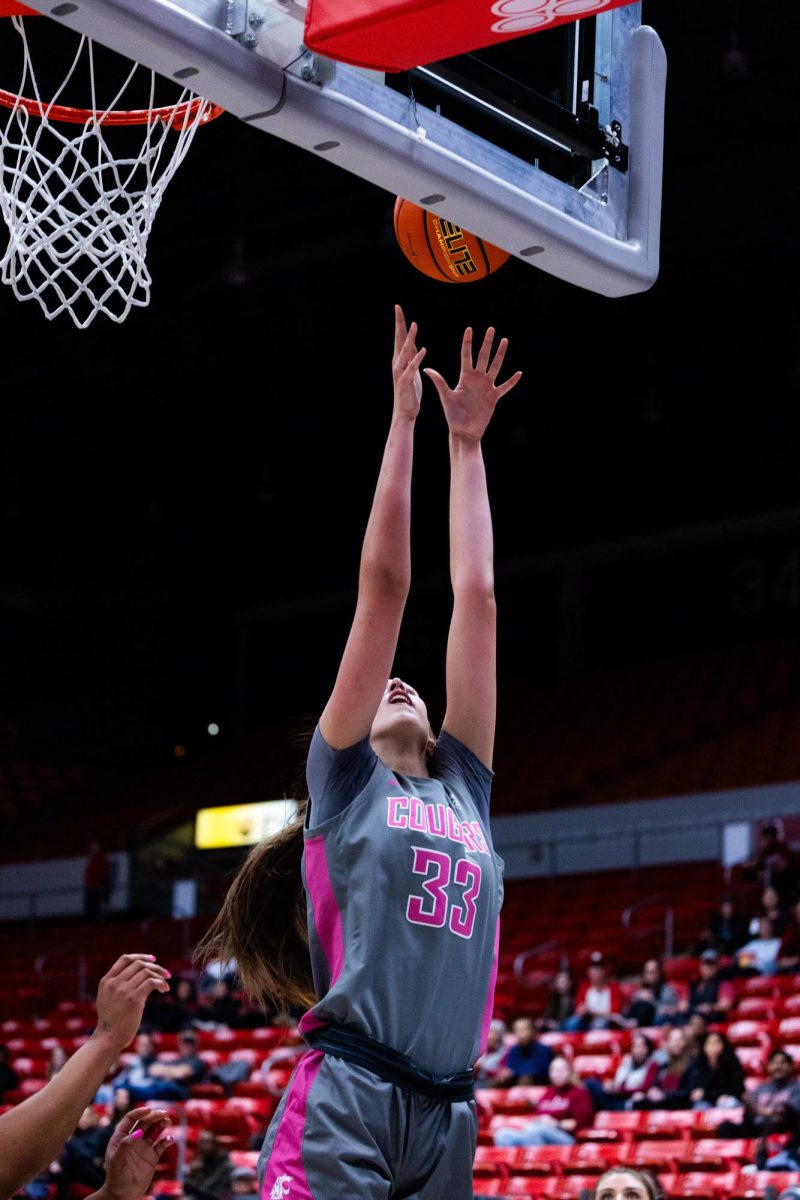 WSU center Alex Covill puts the ball up for a layup in an NCAA womens basketball game against Stanford, Feb. 11, 2024, in Pullman, Wash. 