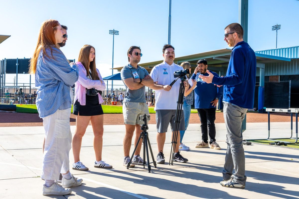 Five of the Murrow Spring Training students interview Gary Hill Jr., March 11, in Peoria, Arizona. 