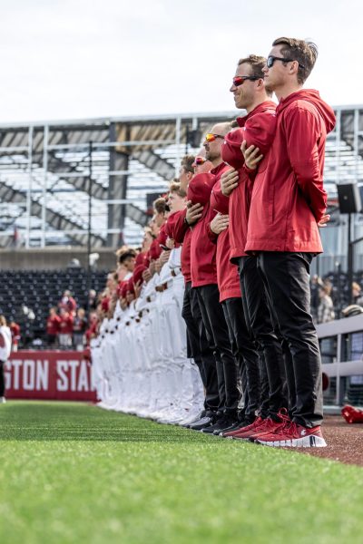 The WSU baseball team lines up for the national anthem ahead of a game against Seattle U, March 20, in Pullman, Wash. 