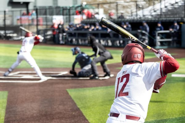 Jacob Morrow timing up the pitcher on the on-deck circle, March 2, in Pullman, Wash.