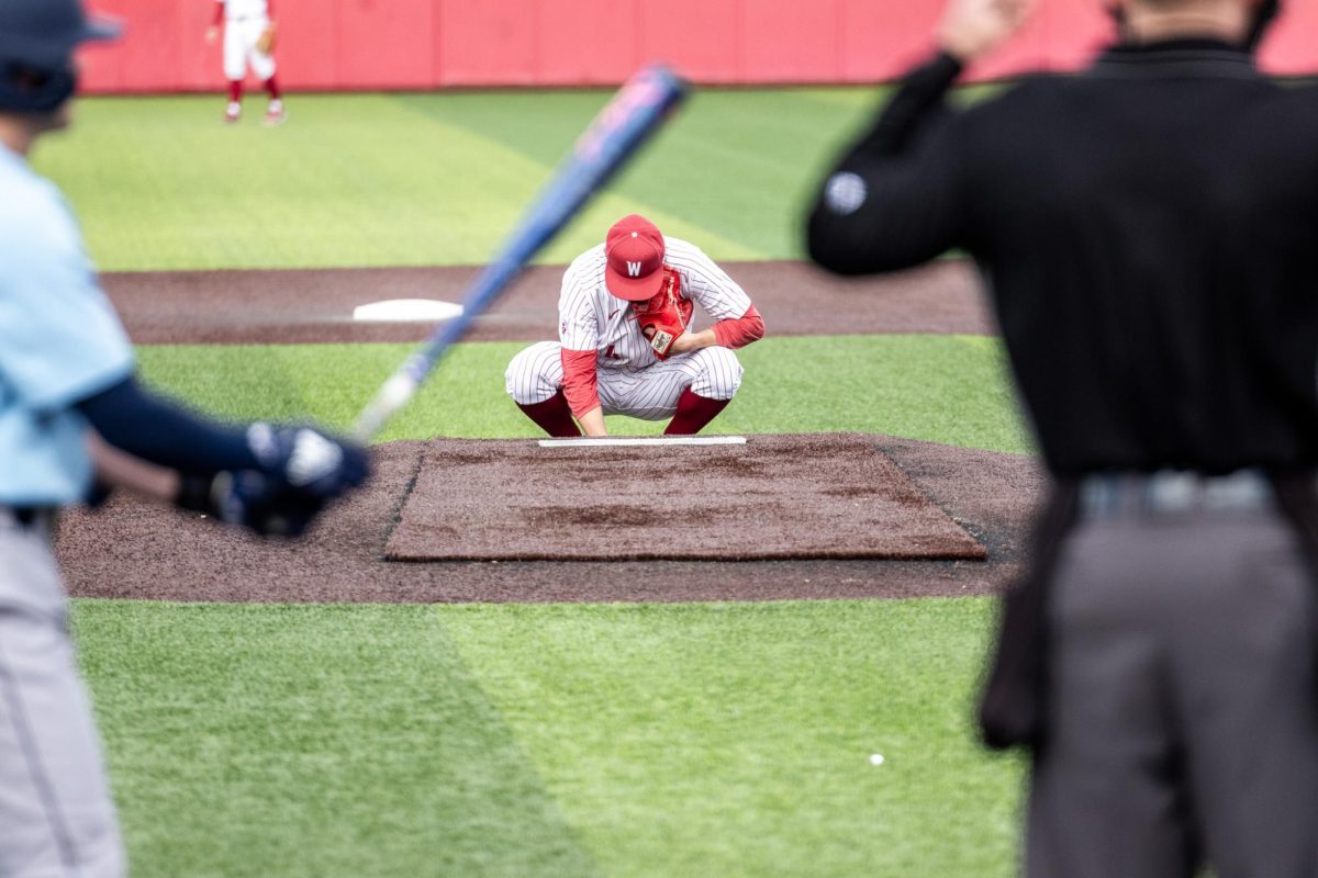 Grant Taylor takes a second behind the mound prior to first pitch against Rhode Island, March 3, in Pullman, Wash. 