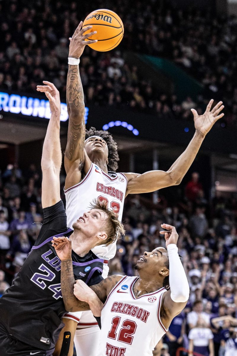 Alabama forward Nick Pringle jumps for a rebound during a second-round match against GCU, March 24, 2024, in Spokane, Wash.