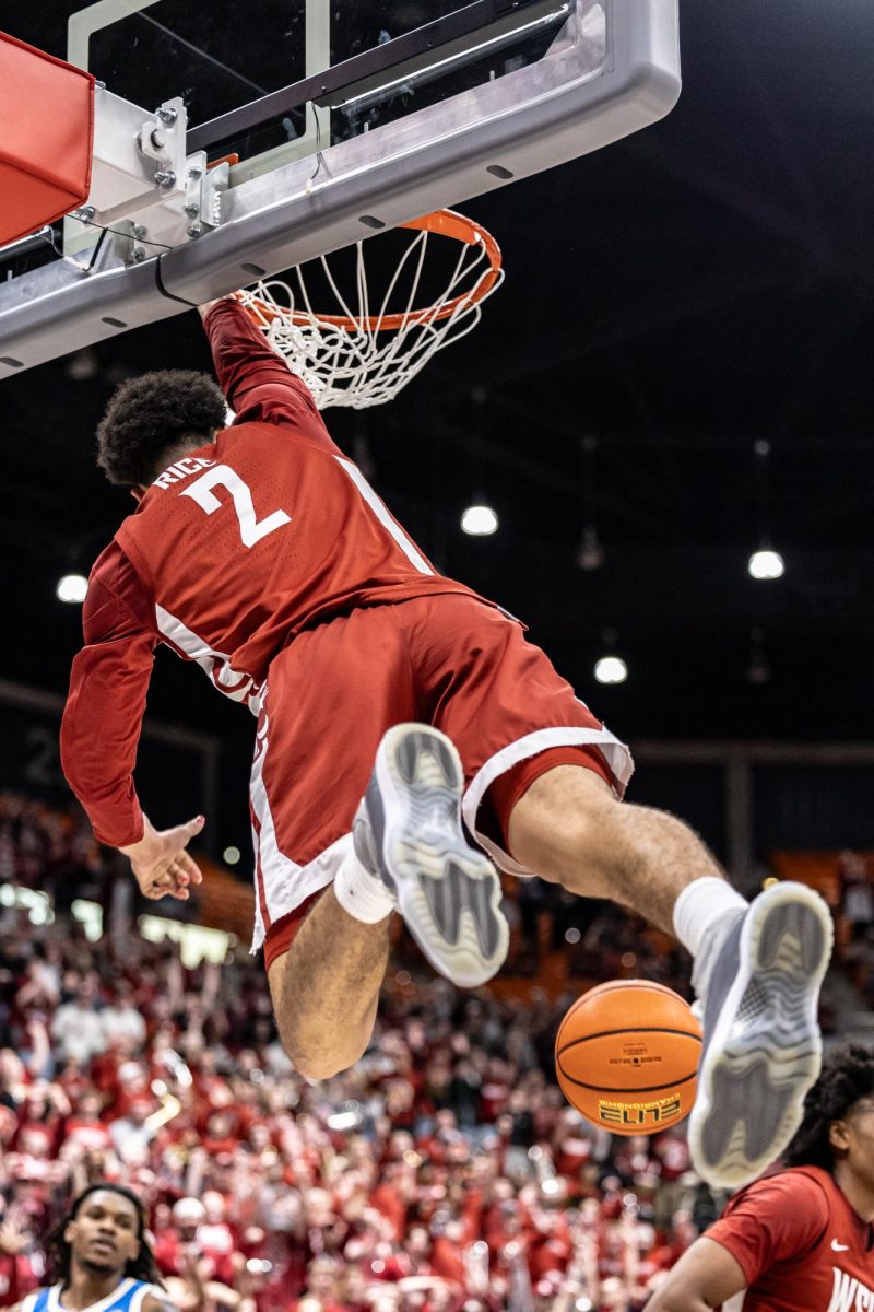 WSU guard Myles Rice dunks the ball during an NCAA men’s basketball game against UCLA, March 2, 2024, in Pullman, Wash.