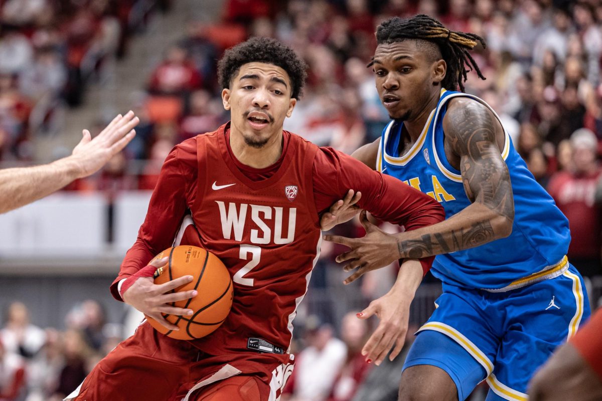 WSU guard Myles Rice drives toward the basket during an NCAA men’s basketball game against UCLA, March 2, 2024, in Pullman, Wash.