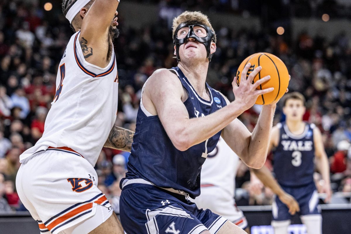 Yale forward Danny Wolf drives toward the basket during a first-round match against Auburn, March 22, 2024, in Spokane, Wash.