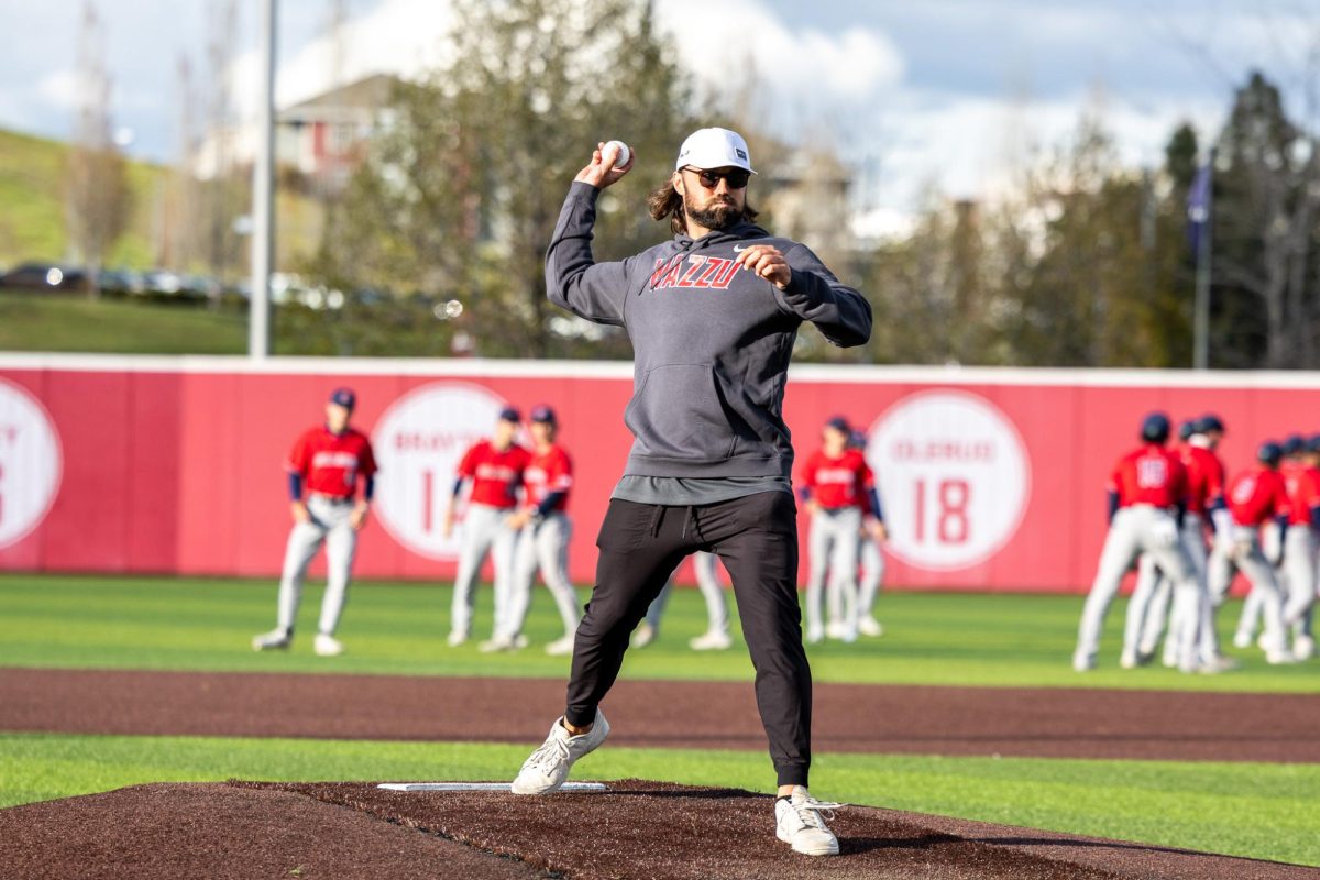Gardner Minshew throws out the first pitch of the WSU baseball game, April 26, in Pullman, Wash. 