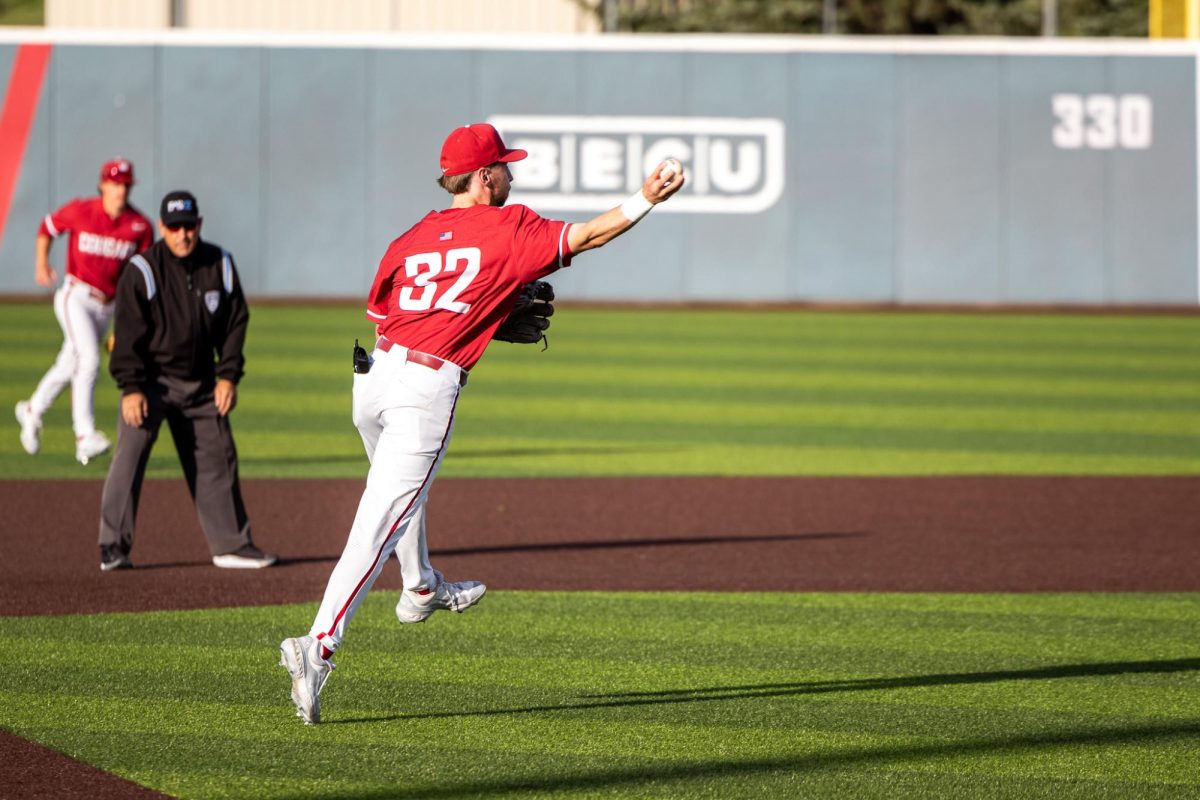 Cole Cramer makes an on-the-run throw to record an infield assist, April 26 in Pullman, Wash. 