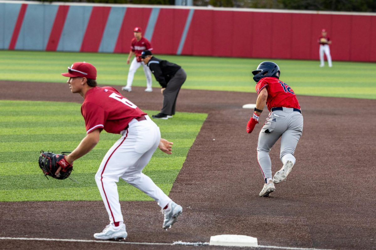 Fresno State shortstop Ben Newton takes off in an attempt to steal a base, April 26, in Pullman, Wash. 