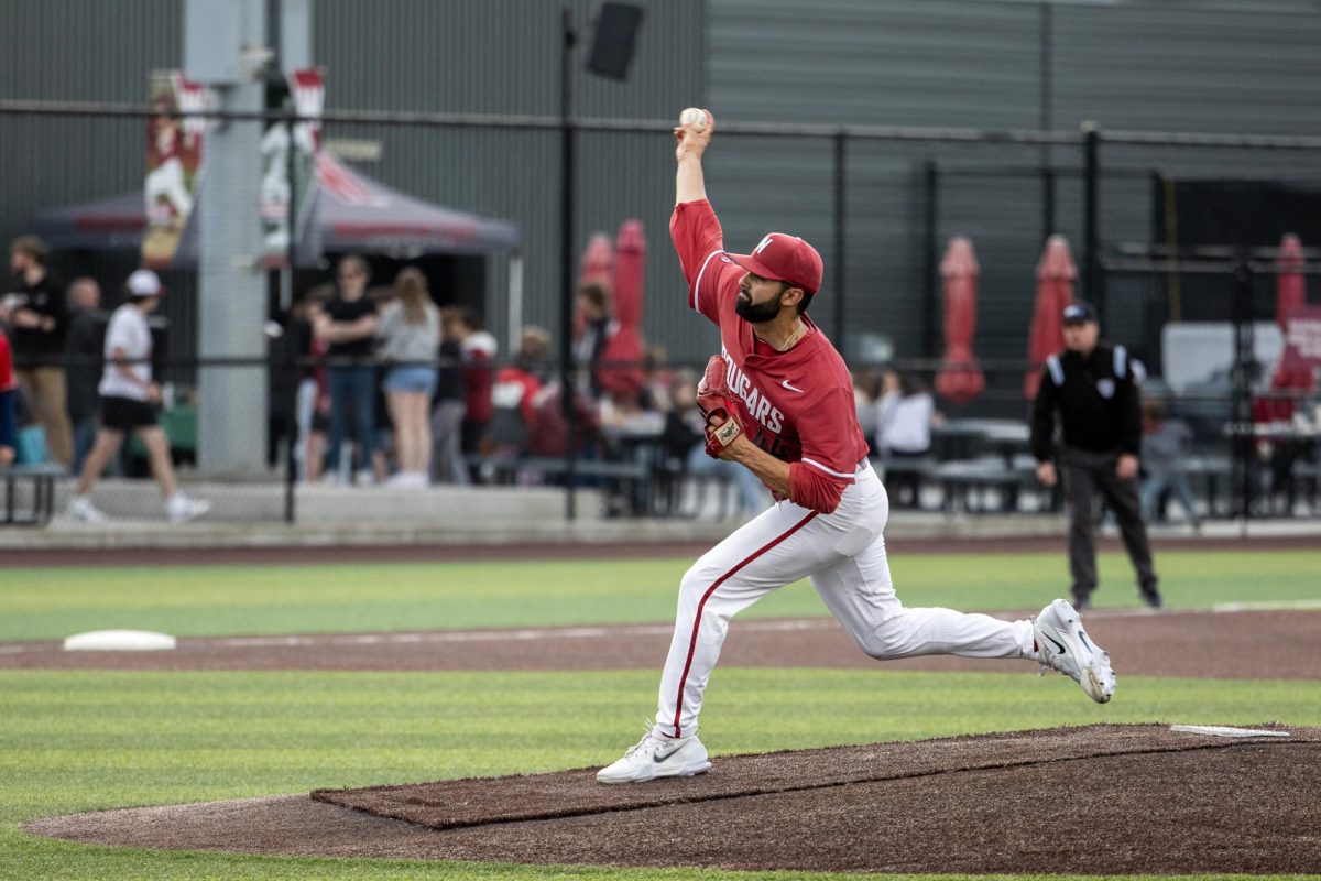 WSU starting pitcher Grant Taylor throws a pitch in the early stages of a game against Fresno State, April 26, in Pullman, Wash. 