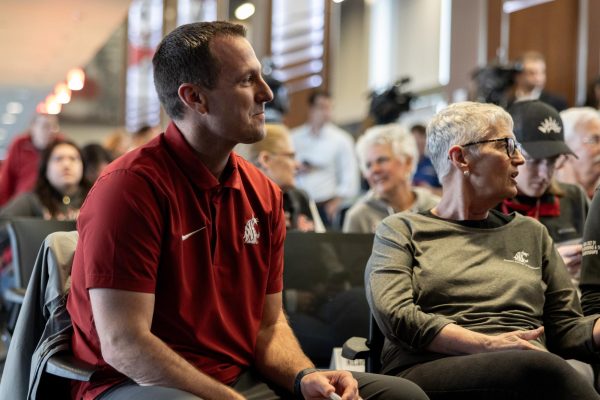 WSU football head coach Jake Dickert sits in attendance for new MBB coach David Riley's press conference, April 4, in Pullman, Wash. 