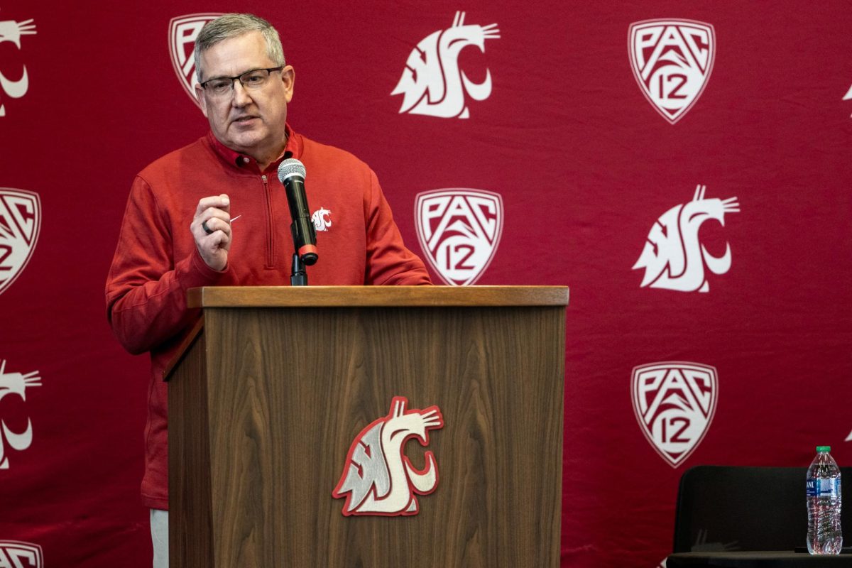 WSU President Kirk Schulz introduces the newest head coach of the Cougs, April 4, in Pullman, Wash. 