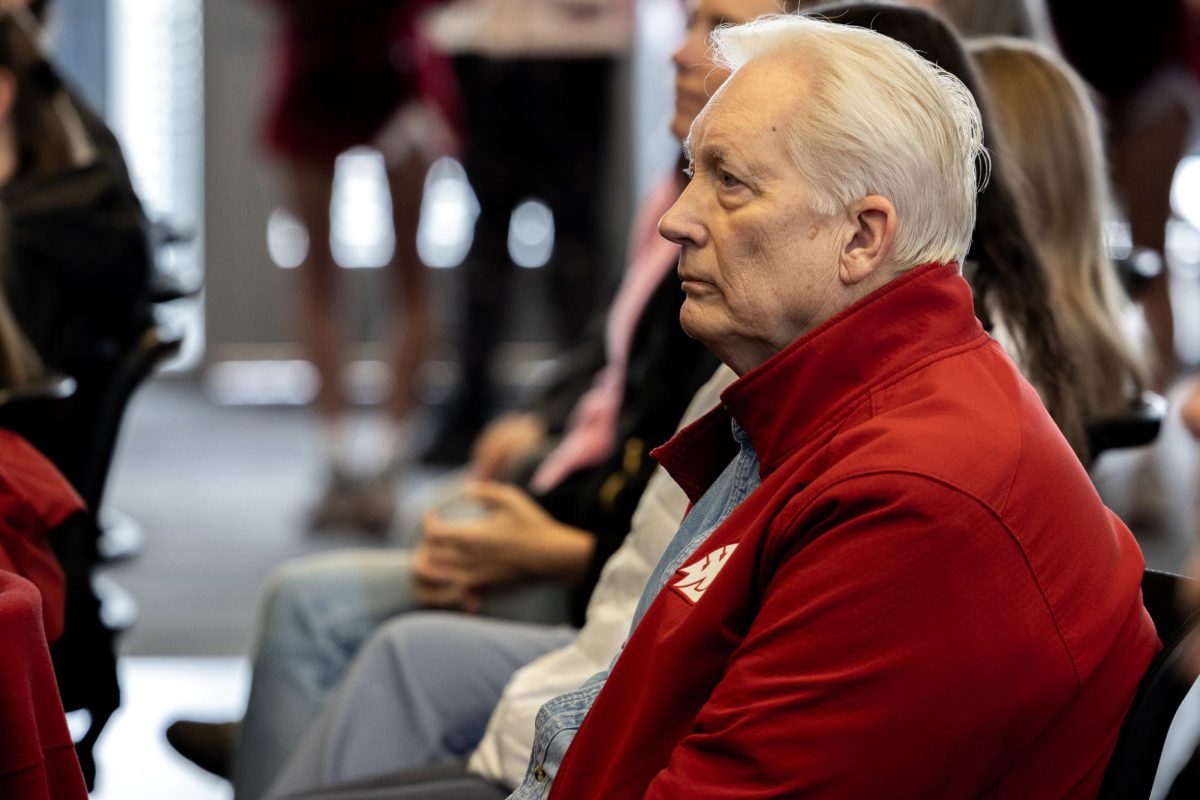 Former Pullman Mayor Glenn Johnson sits in attendance for David Rileys introductory press conference, April 4, in Pullman, Wash. 