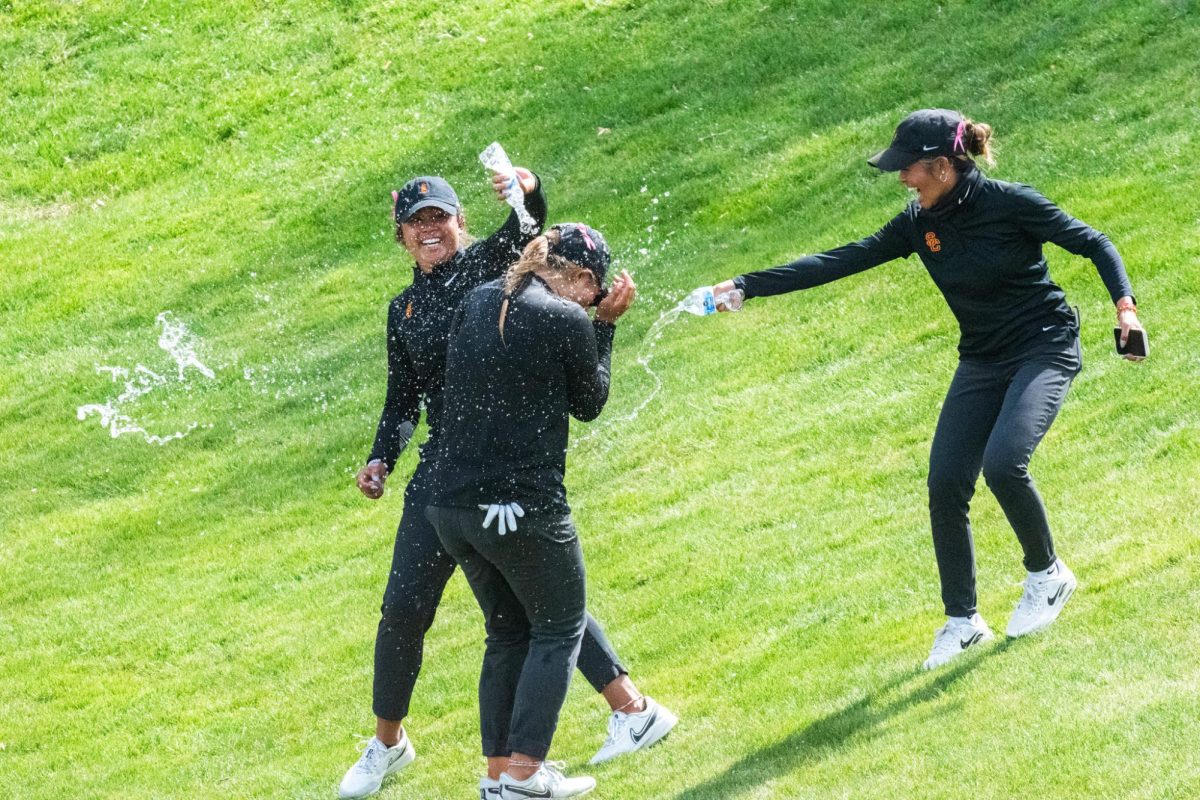 USC+showers+Catherine+Park%2C+the+2024+Pac-12+Womens+Golf+individual+champion+with+water%2C+April+23+at+Palouse+Ridge+Golf+Club+in+Pullman.