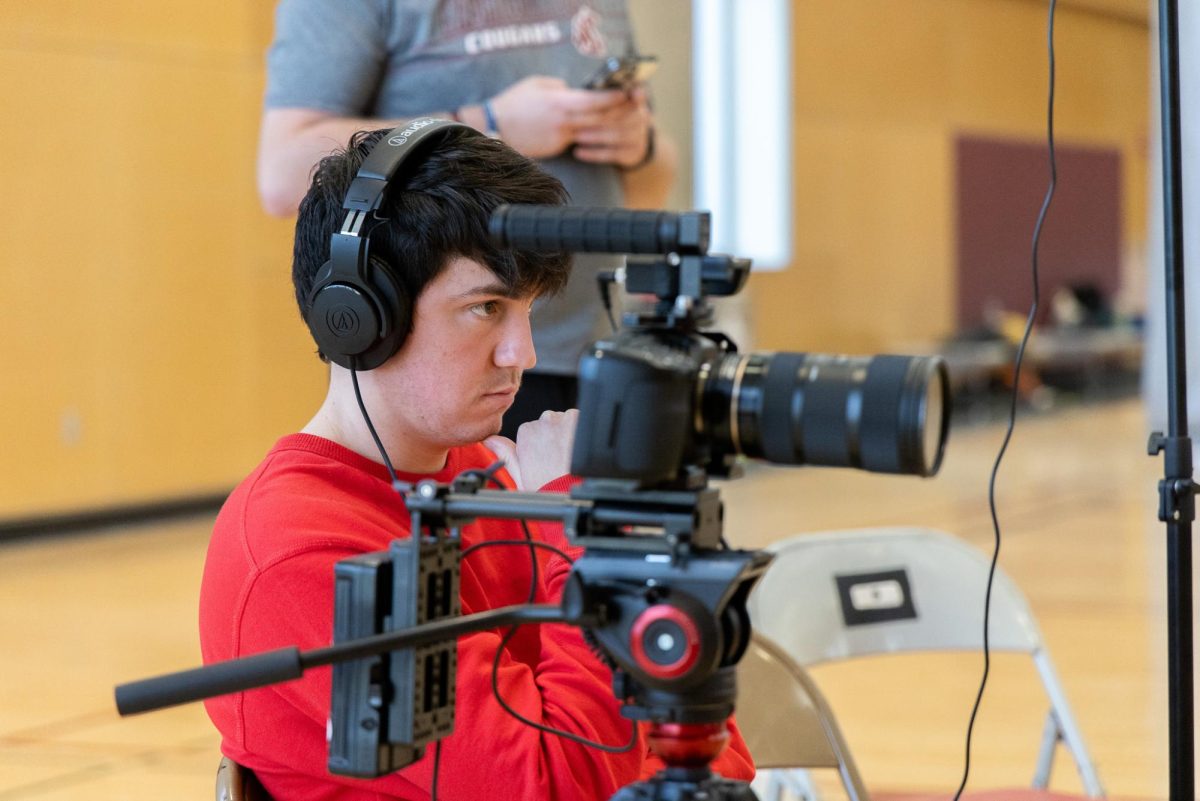 Andy Guerrero filming in the Student Recreation Center.