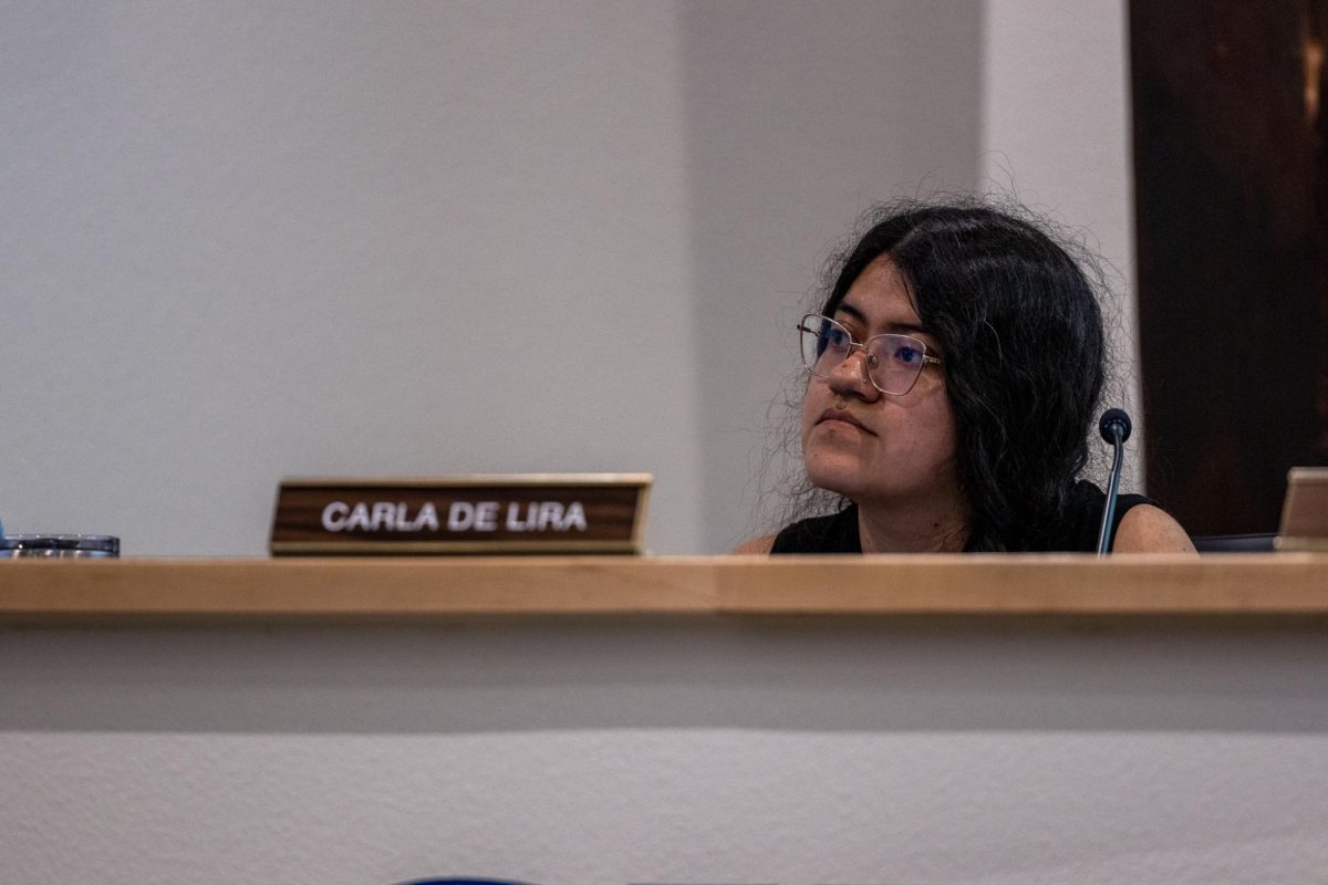 Councilwoman Carla De Lira listens to public advocation for the Pullman City Council to call for a ceasefire of the Israel-Hamas war, De Lira expressed support for the cause during her comments, June 11, in Pullman, Wash. 