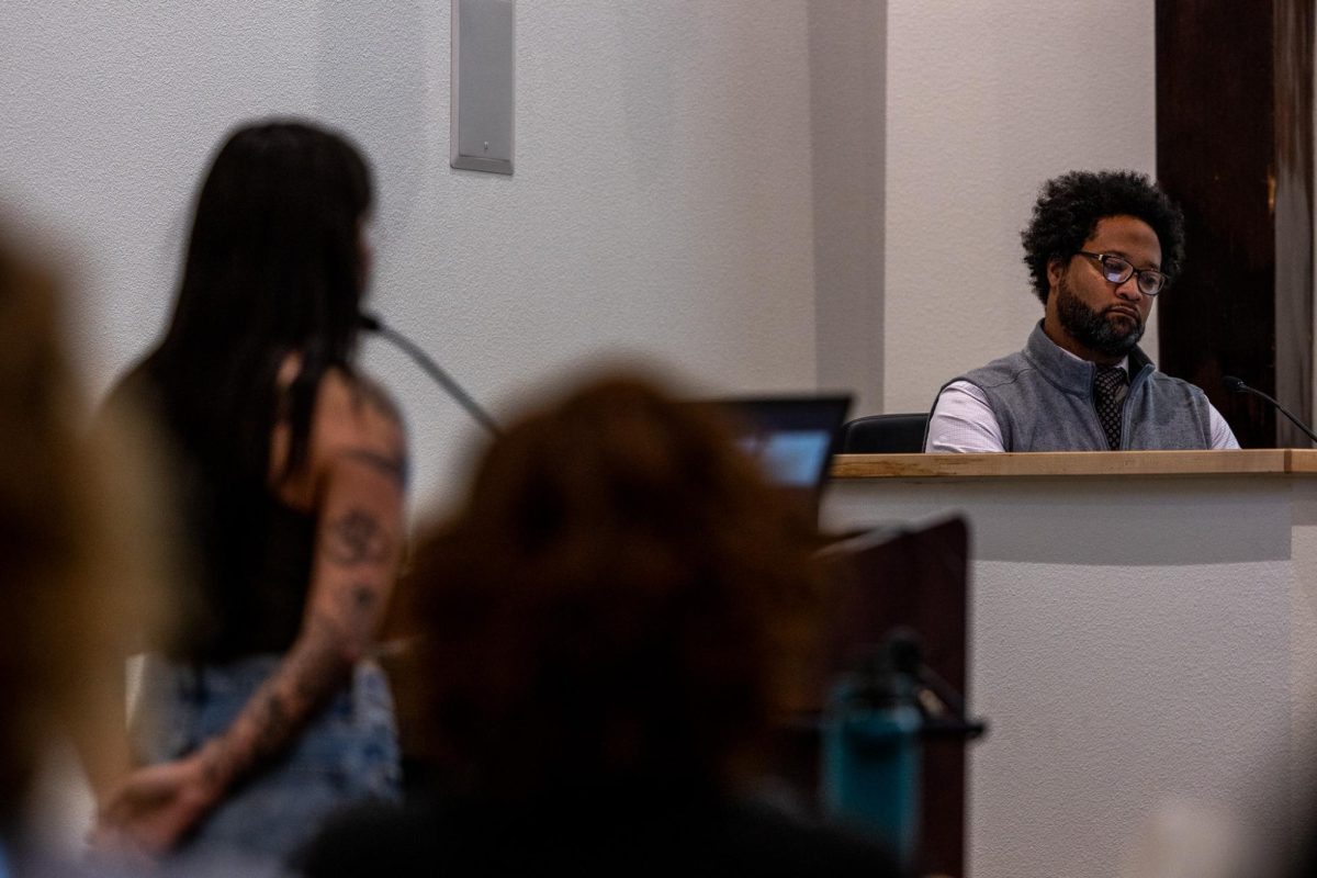 Councilman Trymaine Gaither looks down during WSU students Angie Bells comment calling for the Council to call for a ceasefire of the Israel-Hamas war, June 11, in Pullman, Wash. 