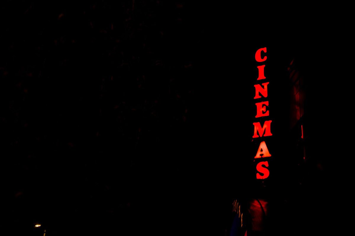 The "Cinemas" sign illuminates following the announced intended closure of the Village Centre Cinema in Pullman, Aug. 20, in Pullman, Wash. 