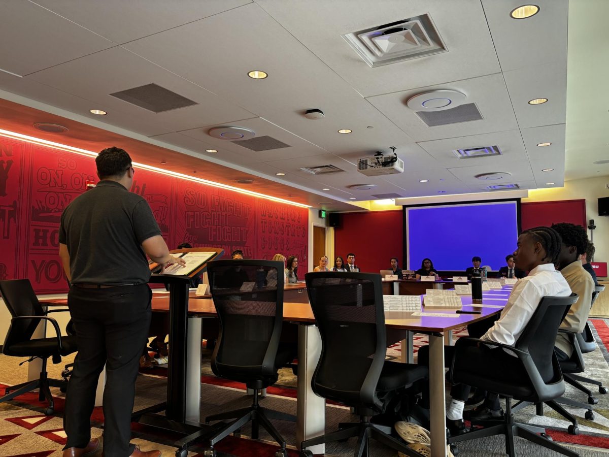 ASWSU Senate Advisor Josue Zuniga addresses Senators on Aug. 21, 2024, in the Compton Union Building in Pullman, Wash.