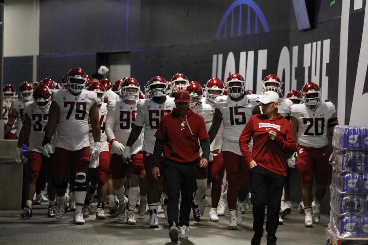 WSU football team led by head coach Jake Dickert through the tunnel before the 2024 Apple Cup in Seattle, Wash.