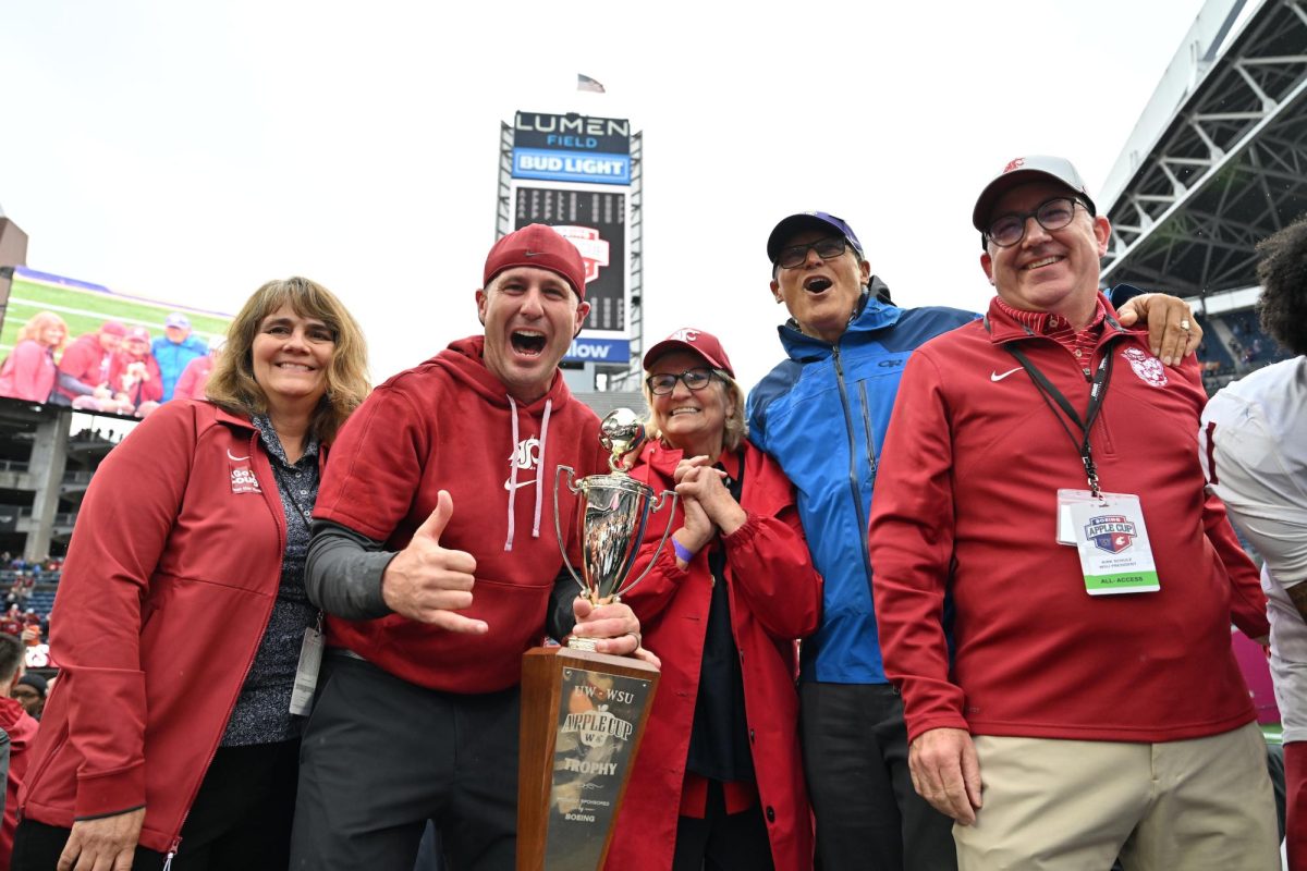 Head Coach Jake Dickert celebrates a 2024 Apple Cup win in Lumen Field in Seattle, WA. 