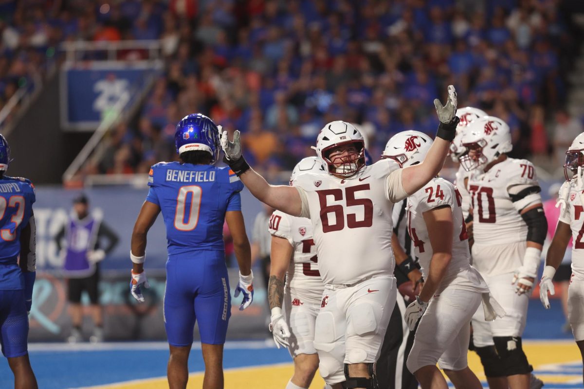 WSU offensive lineman Brock Dieu celebrated a Cougar touchdown in a week five football matchup against Boise State at Albertson Stadium in Boise, Idaho.