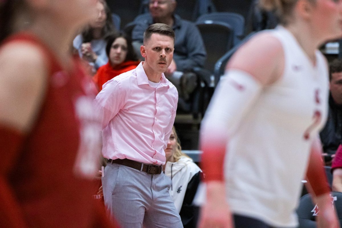 Korey Schroeder coaching the WSU volleyball team against Portland, Oct. 2, in Pullman, Wash. 