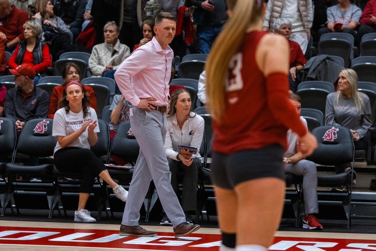 Korey Schroeder coaching the WSU volleyball team against Portland, Oct. 2, in Pullman, Wash. 