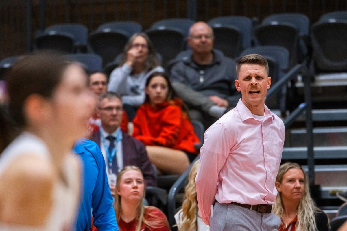 WSU head coach Korey Schroeder gives his team in-game advice against Portland, Oct. 2, in Pullman, Wash. 