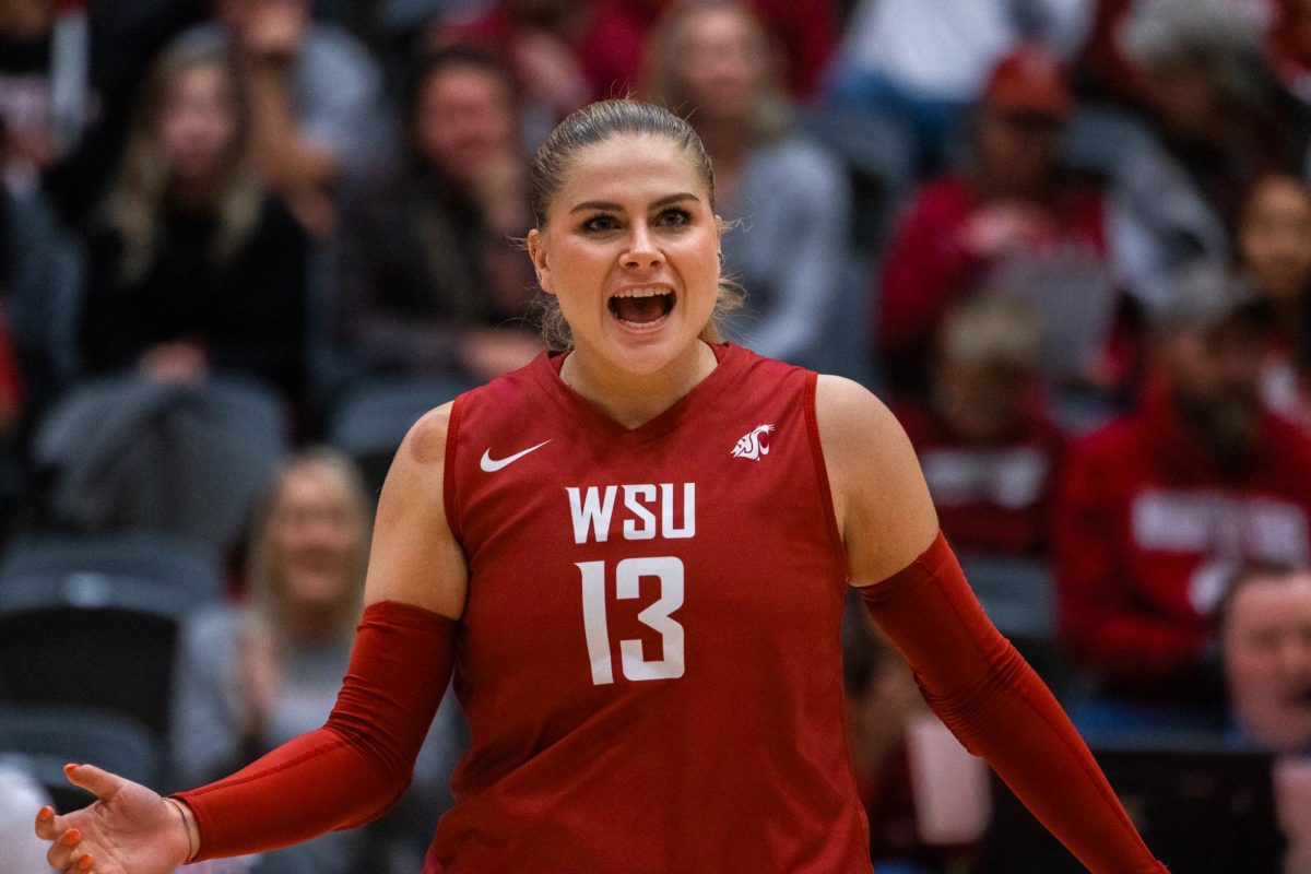 Emma Barbero celebrates a point, Oct. 2, in Pullman, Wash. 