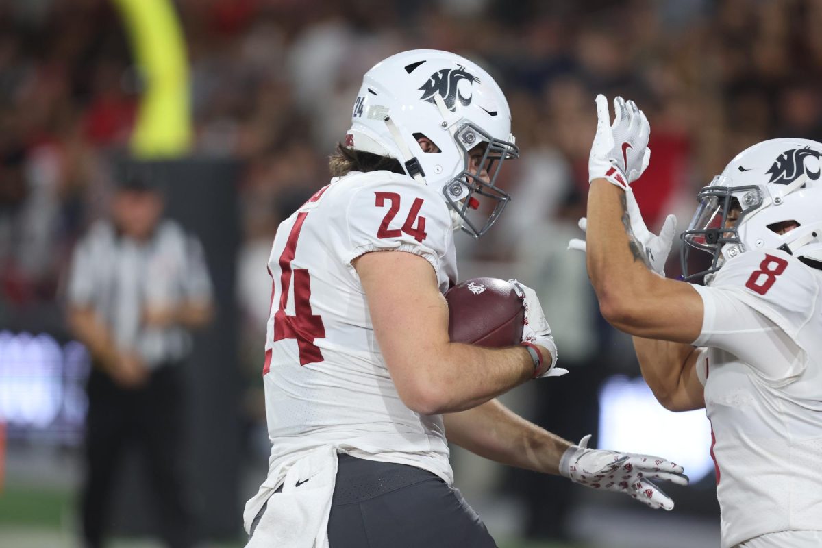 WSU tight end Cooper Mathers celebrates a touchdown catch with wide reeiver Carlos Hernandez in a game against SDSU at Snapdragon Stadium in San Diego, Calif.