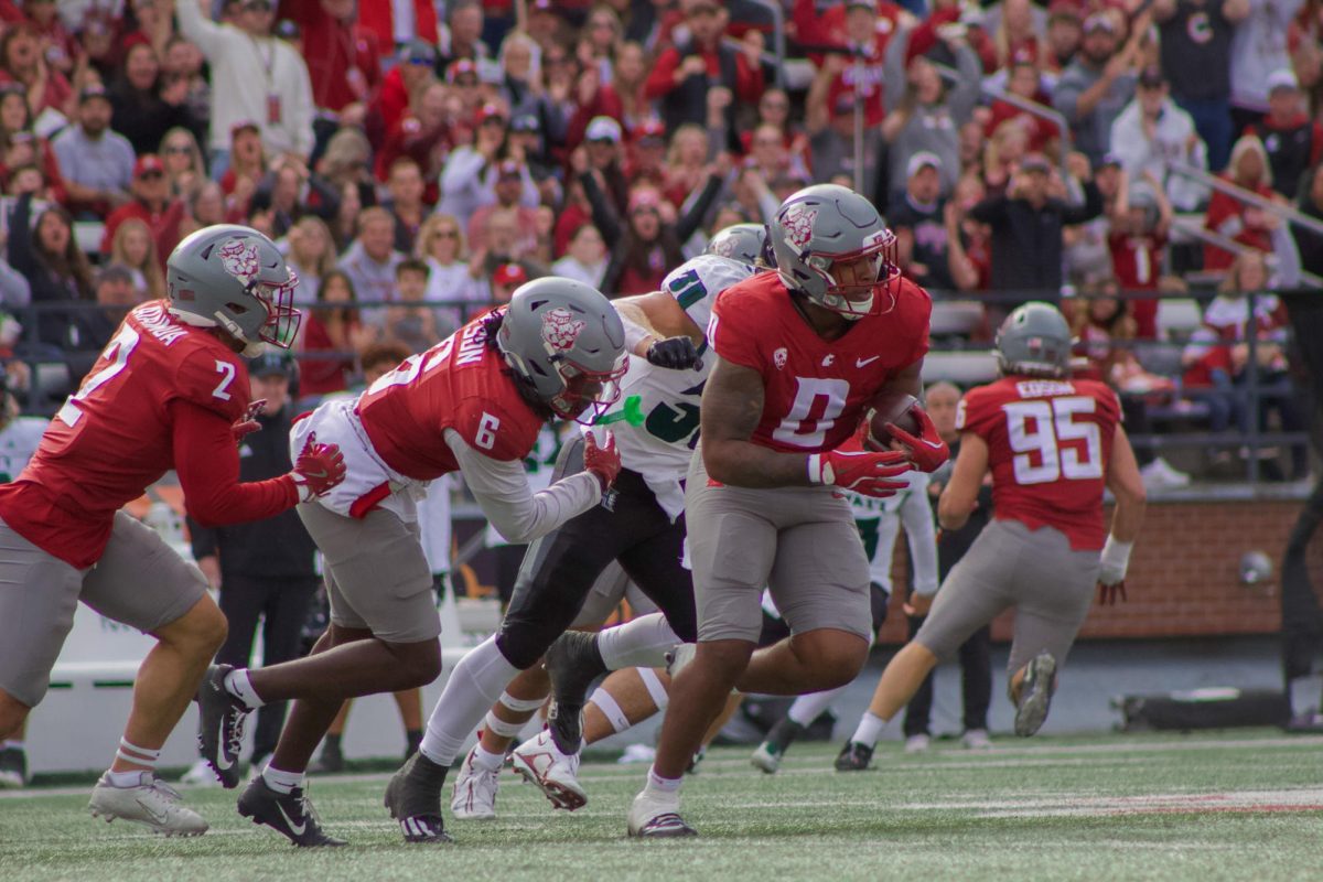 WSU linebacker secures a turnover for the WSU defense in a game vs Hawai'i.