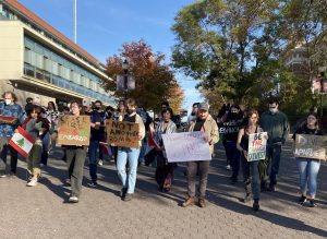 The protesters marching down Terrell Mall Monday afternoon.