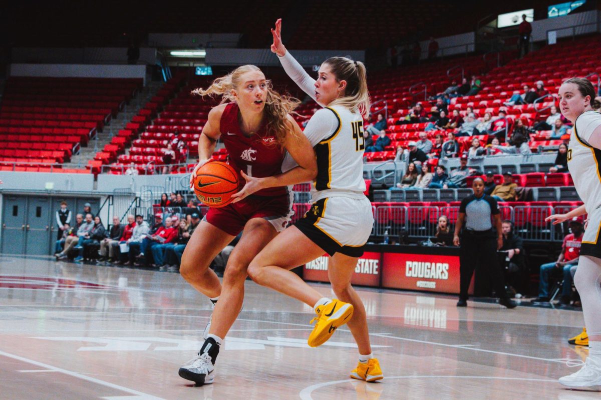 Tara Wallack hop steps in the lane before attempting a layup against Idaho, Nov. 10, in Pullman, Wash.