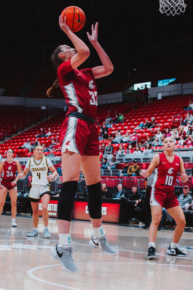 Alex Covill finds herself wide open at the basket for a quick layup in the first quarter against Idaho, Nov. 10, in Pullman, Wash. 