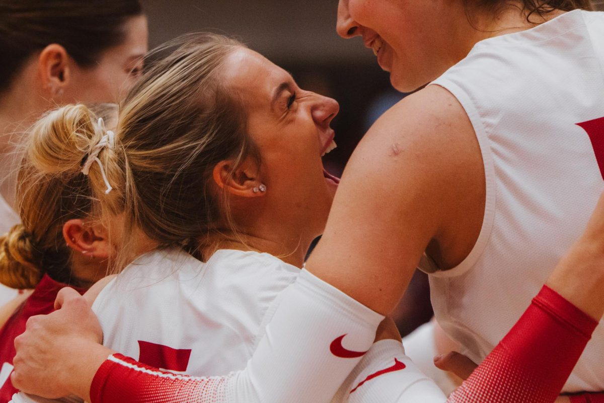 Setter Jaden Walz celebrates toward her teammates after the Cougs scored a point, Nov. 9, in Pullman, Wash. 