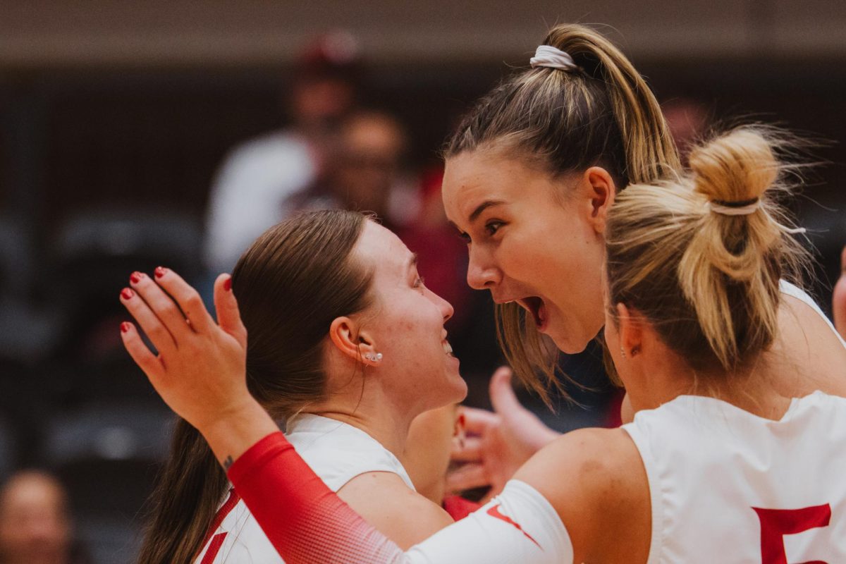 Lucie Blažková and Logann Golden stare at each other to celebrate, Nov. 9, in Pullman, Wash. 