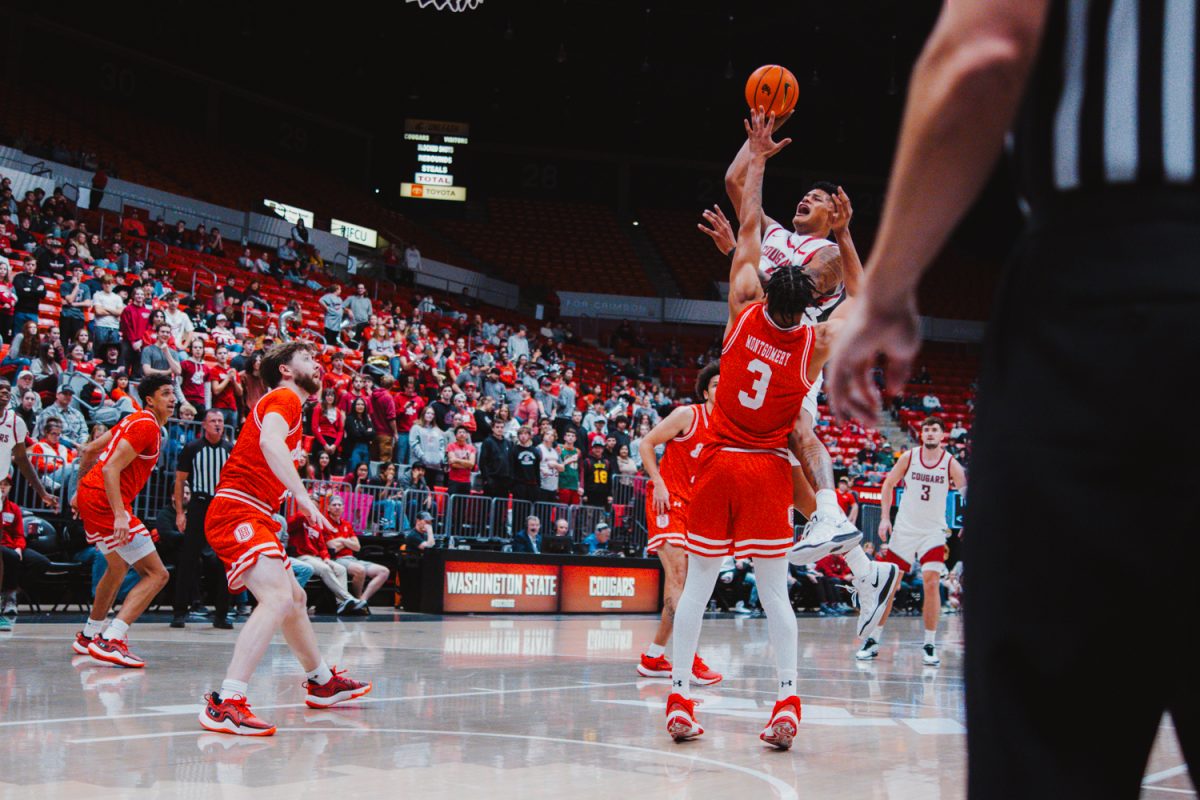 LeJuan Watts sells contact as he takes a floater attempt, Nov. 9, in Pullman, Wash. 