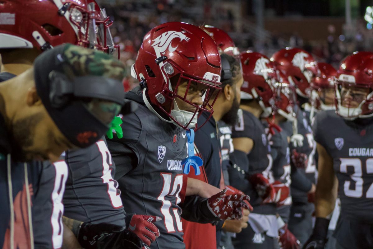 SYDNEY REID | the daily evergreen
WSU players link arms pregame before a win over Utah State at Gesa Field in Pullman, Wash. Nov. 9, 2024.