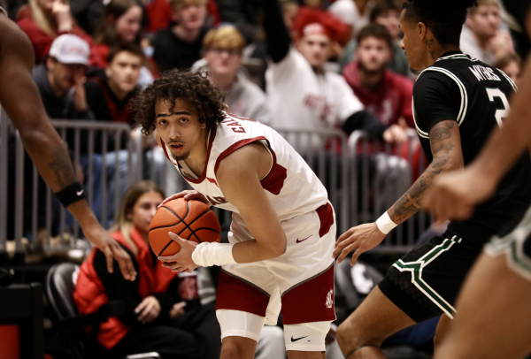 Cougs drop 100 in season opening win