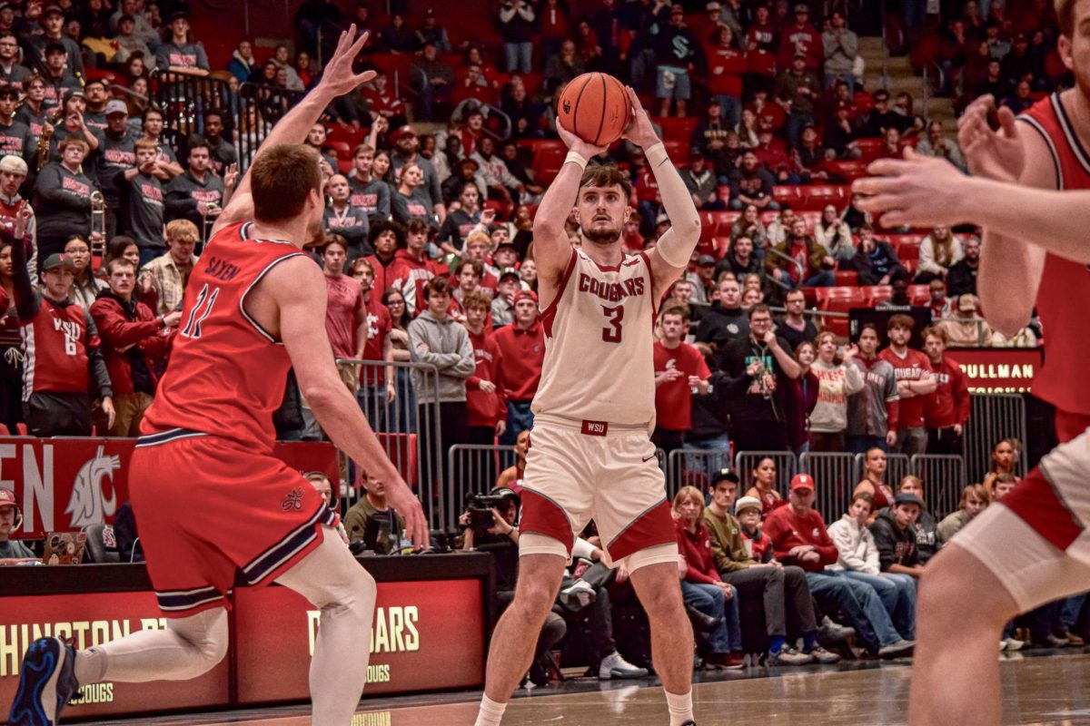 Ethan Price prepares to make a three. He hit four during the Cougs 80-75 loss vs Saint Mary's on Jan. 25, Pullman, WASH. 