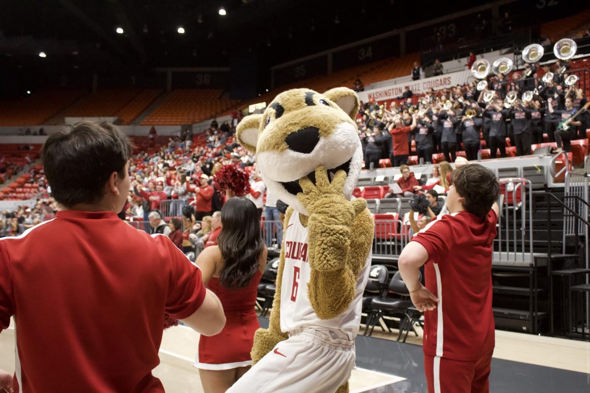 Butch poses for the camera at a men's basketball game against Pacific Jan. 9 in Beasley Coliseum. 